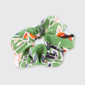 Green and orange floral hair scrunchie by Forever England.